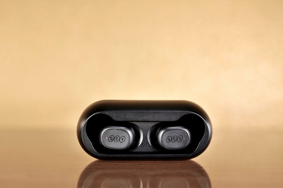 A pair of foam earplugs resting on a nightstand, one accommodation for blocking out recurring late-night noise from a neighbo