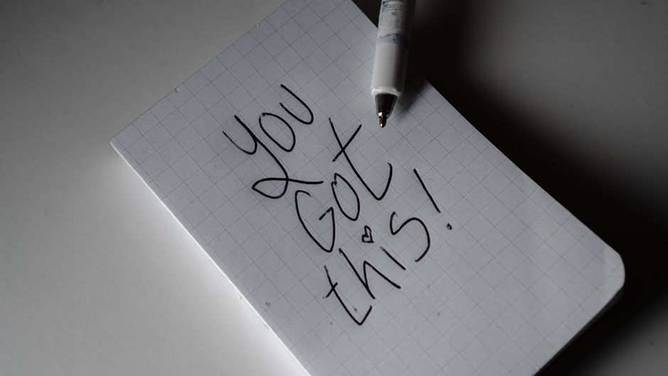 A short handwritten note, the kind of small gesture a neighbor might leave to open the door to making peace.