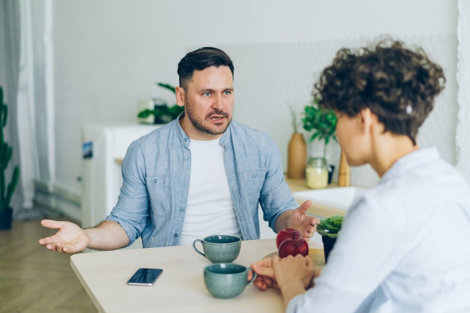 A tenant and a landlord talking calmly about ending a lease early